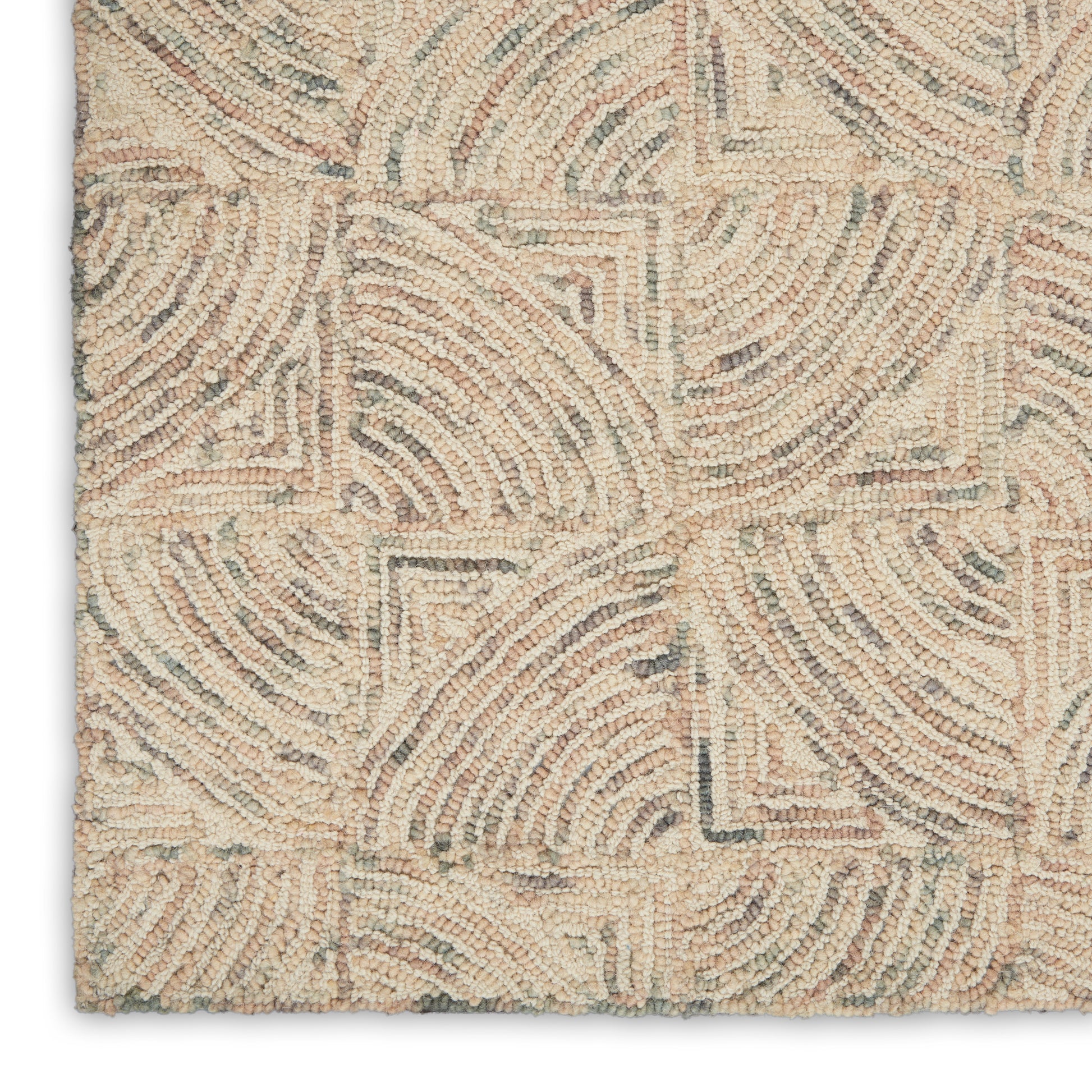 Beige cream-toned boucle rug with abstract curved-line geometric pattern; textured loop pile for living spaces.
