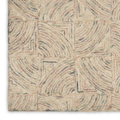 Beige cream-toned boucle rug with abstract curved-line geometric pattern; textured loop pile for living spaces.
