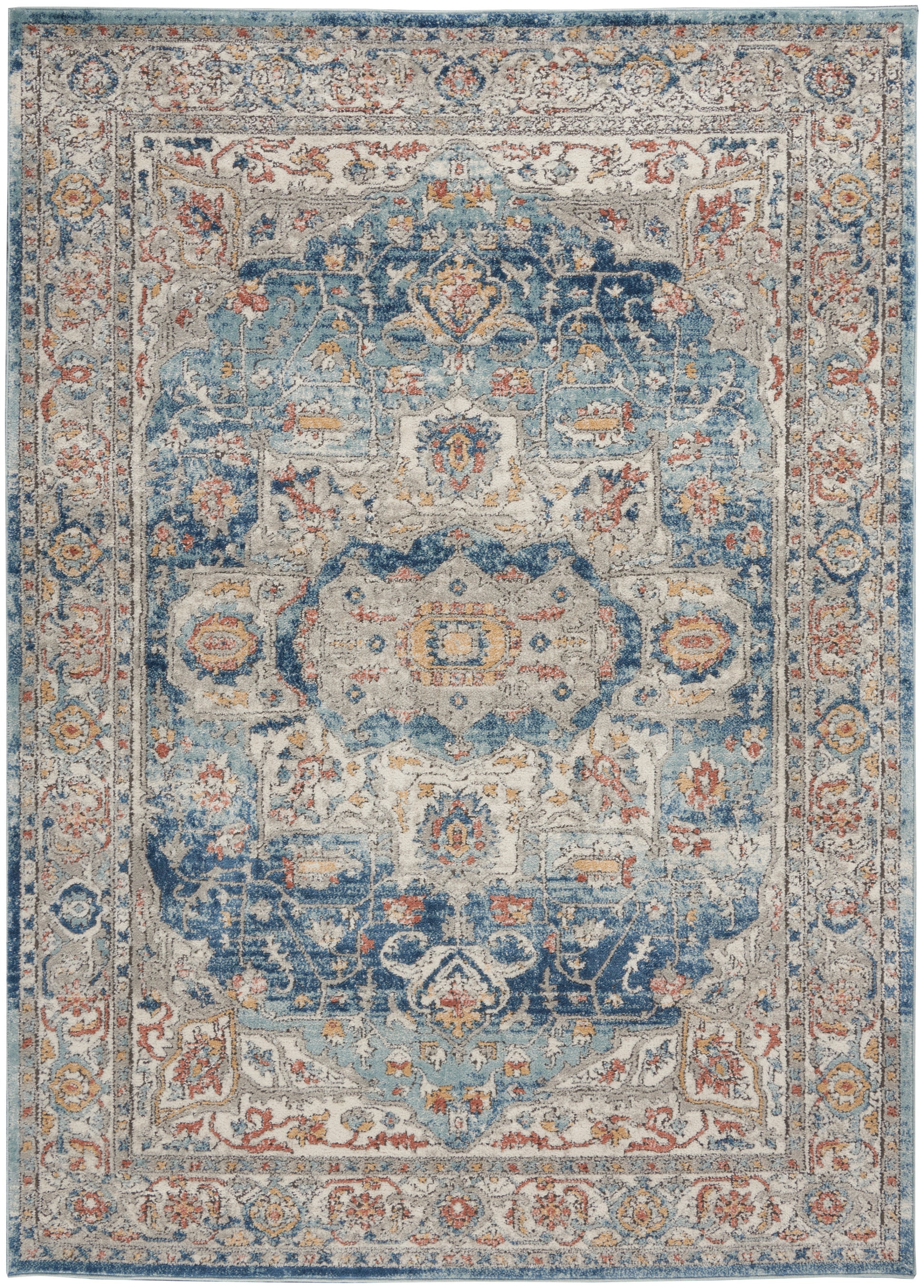 Blue and ivory Persian-style rug with a central medallion, floral motifs, rust accents, and ornate borders.