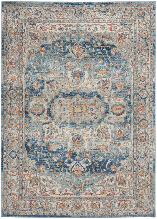 Blue and ivory Persian-style rug with a central medallion, floral motifs, rust accents, and ornate borders.