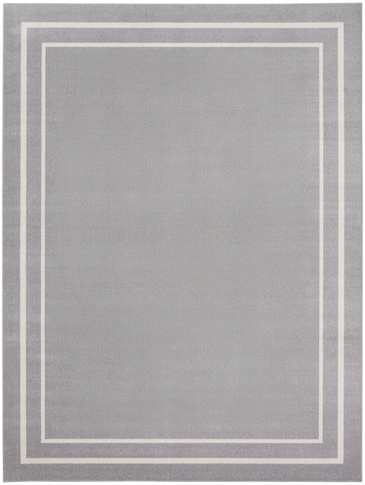 Soft gray area rug with three white nested rectangular borders for a modern minimalist look.