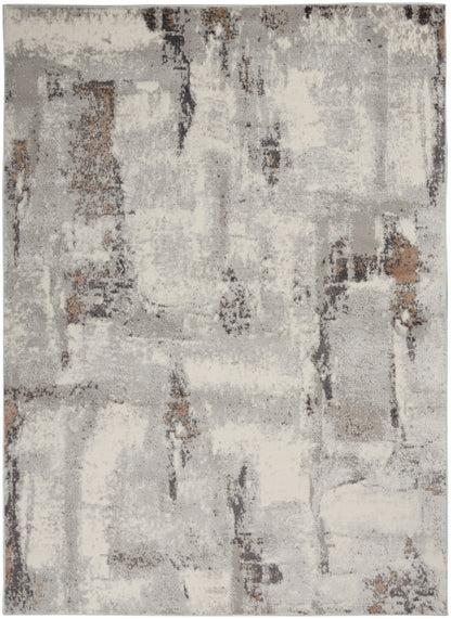 Abstract gray & beige area rug with distressed blocks & brown accents; modern rectangular rug.