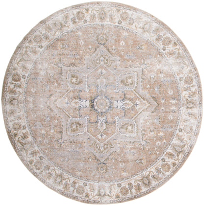 Round distressed beige oriental-style rug with ivory central medallion and floral border.