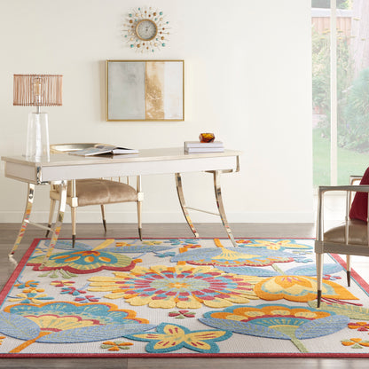 Bright home office with white glossy desk, curved metal legs, beige chair, colorful floral rug, wall art, glass lamp.