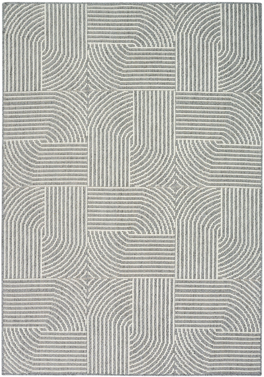 Gray & ivory geometric area rug with patchwork blocks of striped curves; modern abstract style for living room decor.