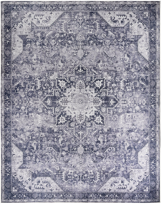Distressed blue-gray Persian-style area rug with a central medallion and ornate floral border.