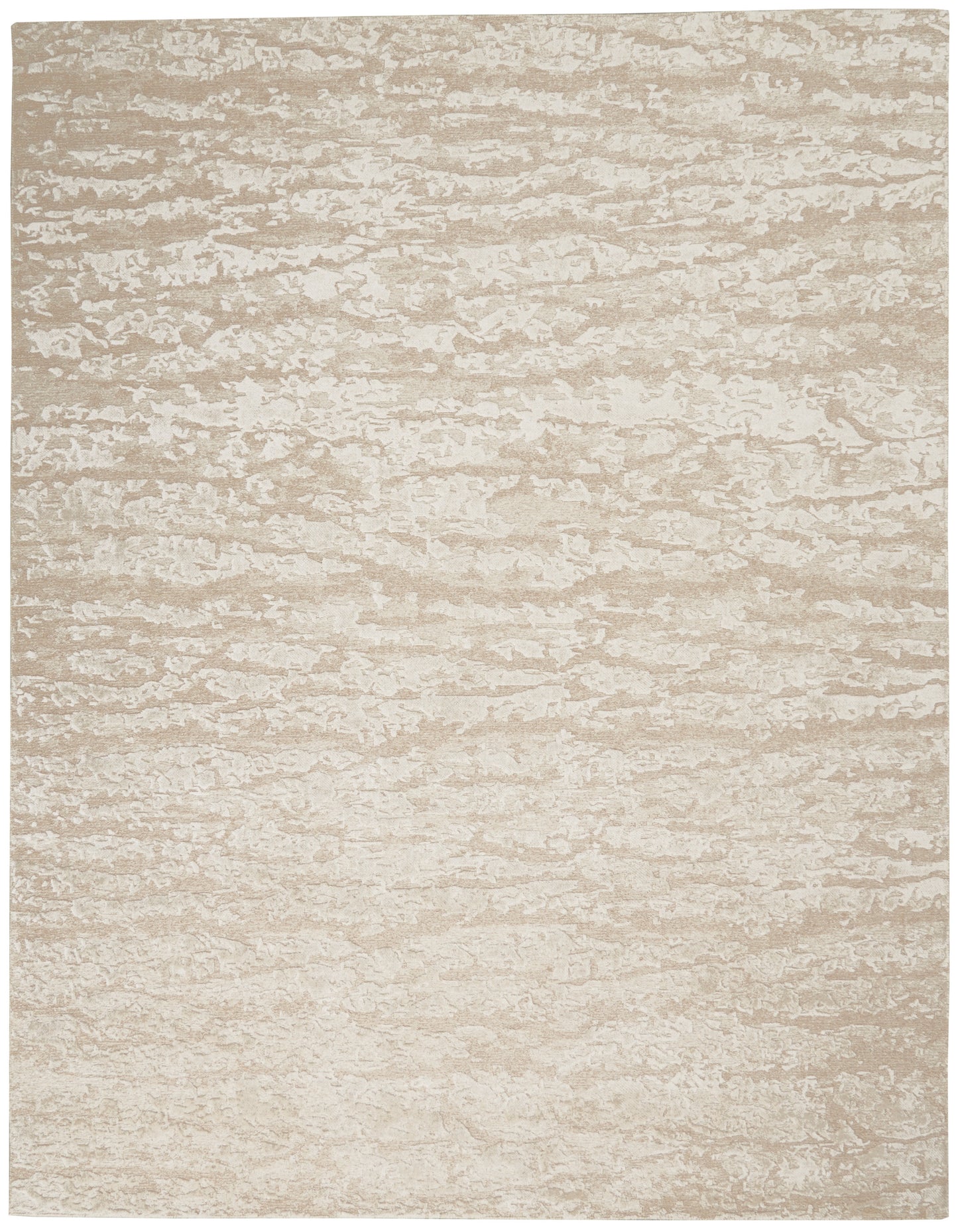 Beige and cream mottled rectangular rug with a soft, textured surface.