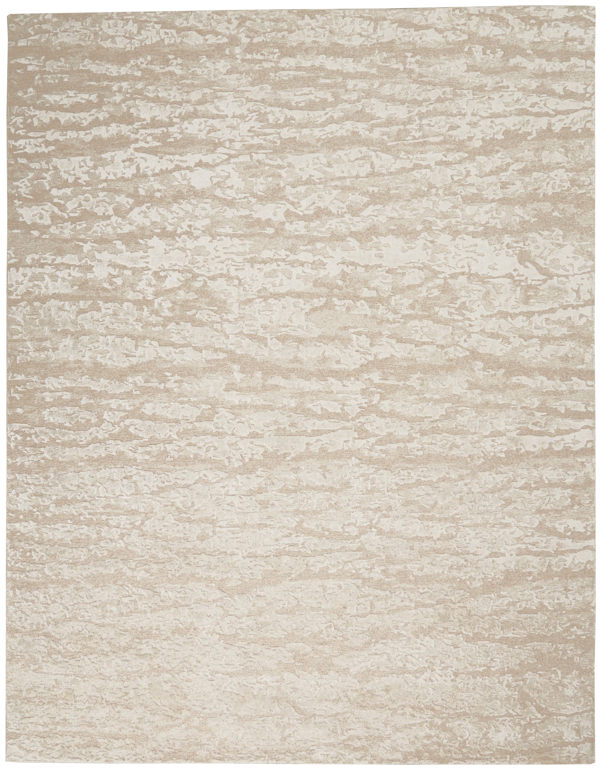 Beige and cream mottled rectangular rug with a soft, textured surface.
