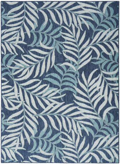Navy blue rug with a white and light-blue palm leaf pattern.