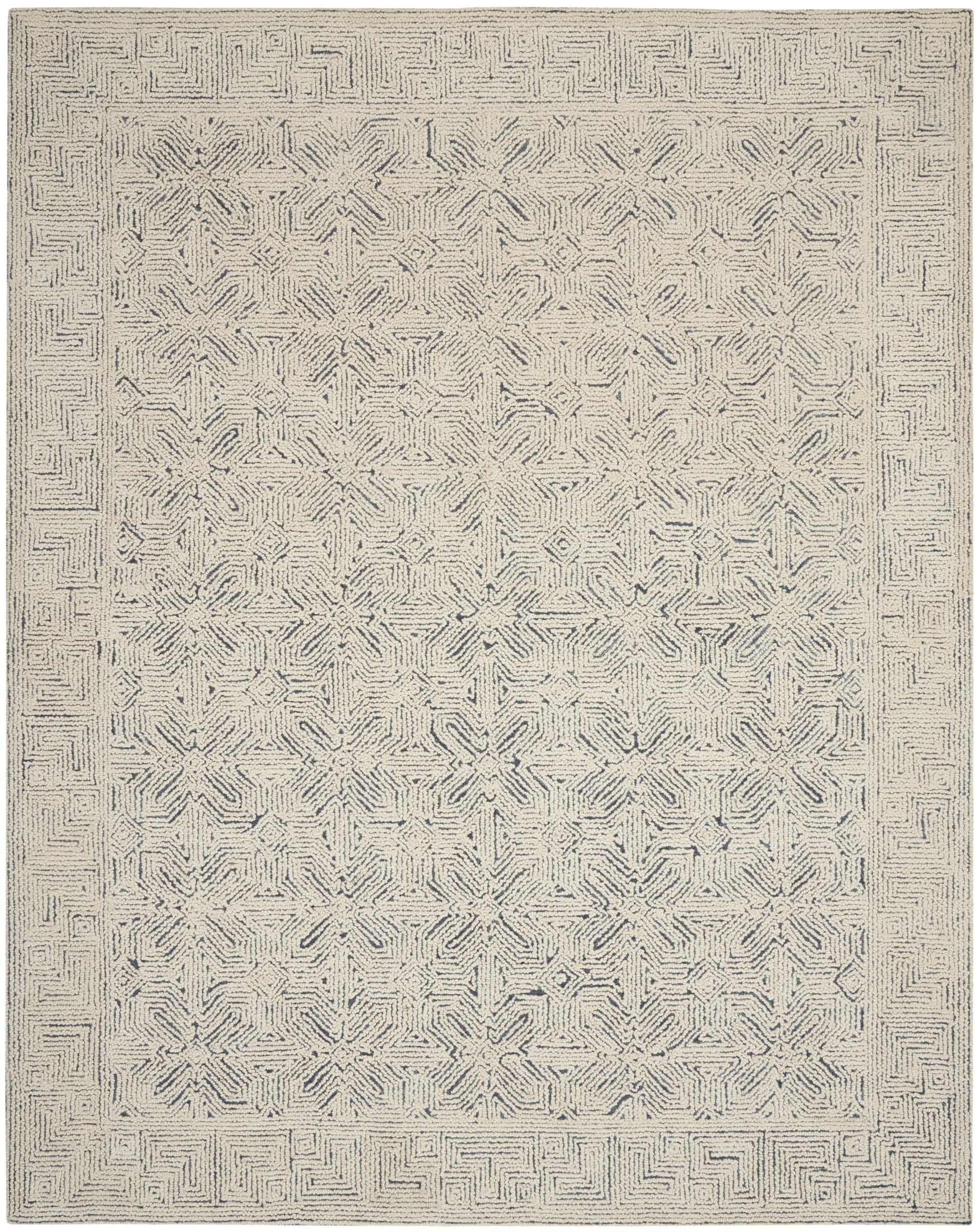 Neutral beige area rug with navy-gray geometric star medallions and maze border; woven texture, rectangular.