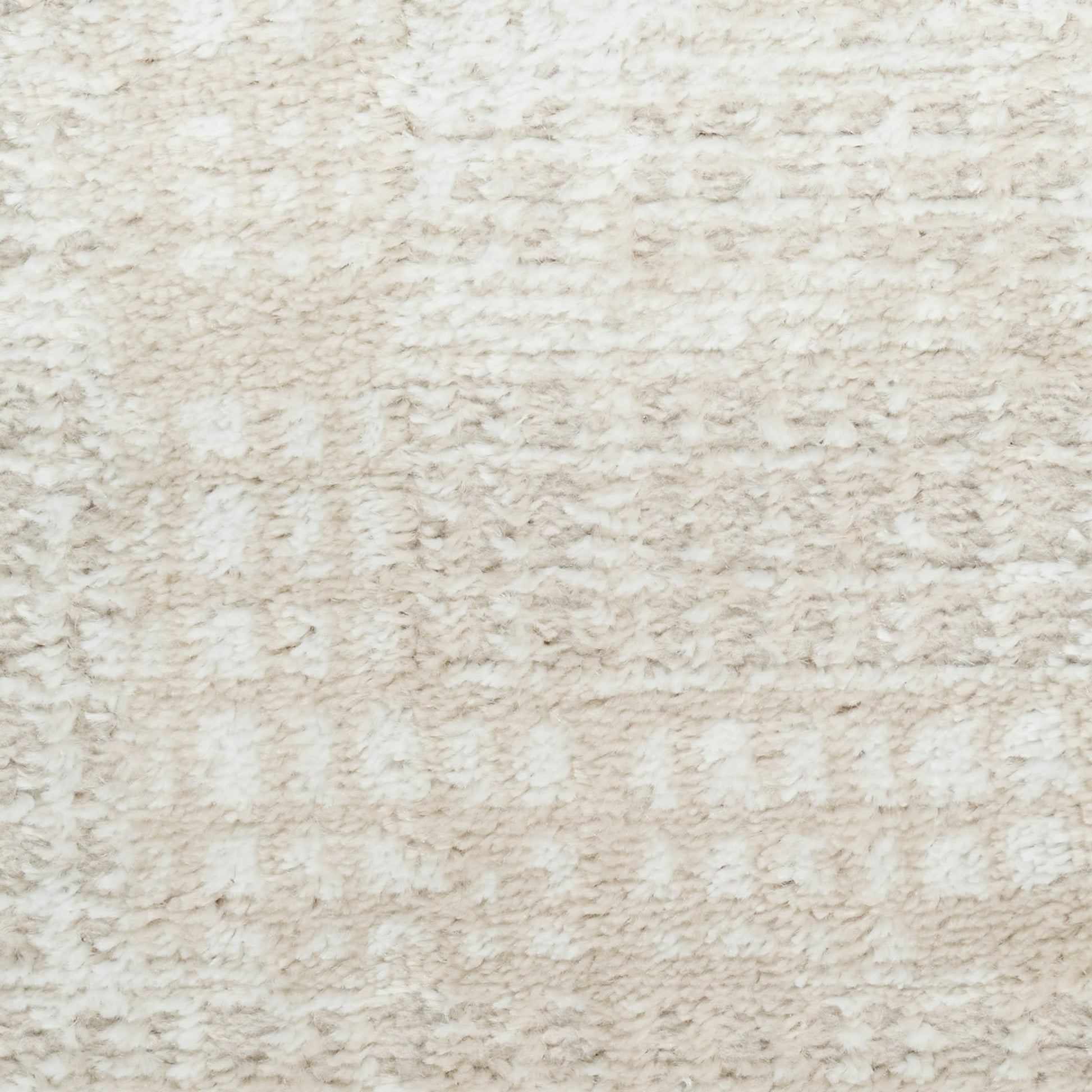 Cream beige textured area rug with plush pile and subtle geometric pattern; cozy living room accent.
