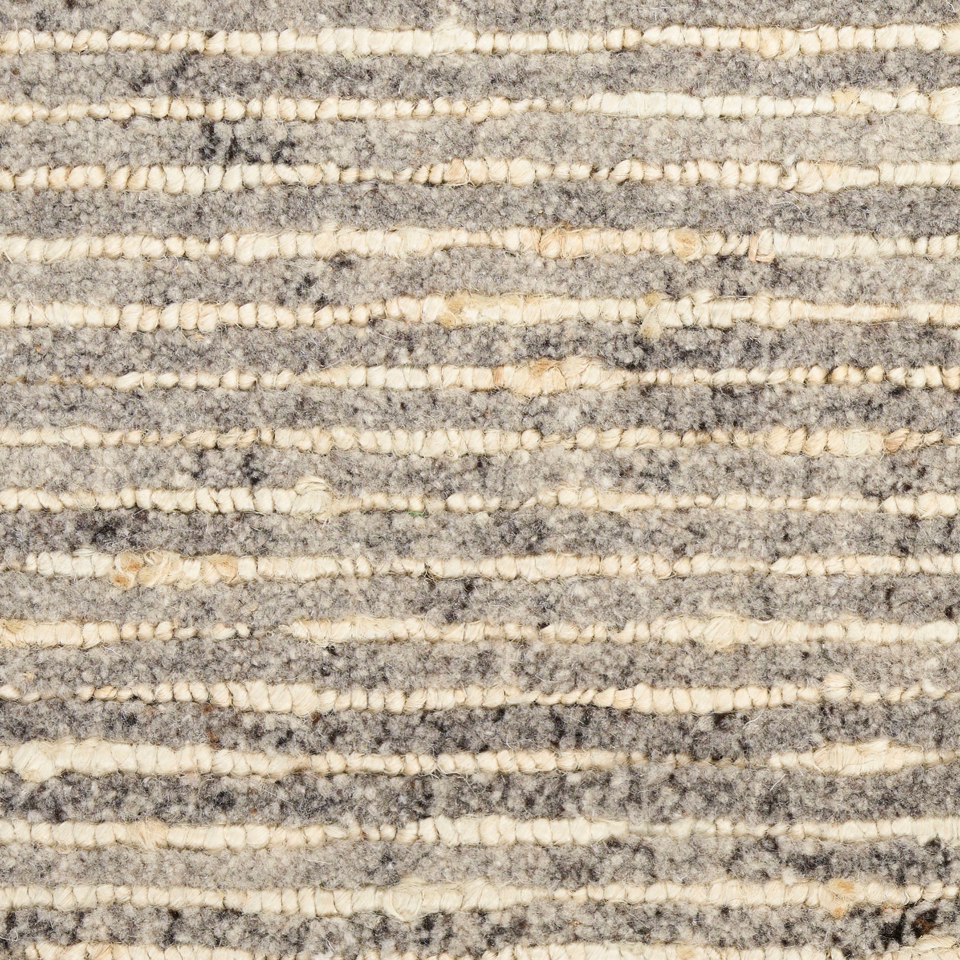 Close-up of a grey and cream striped textured rug with looped pile for cozy modern d??cor.