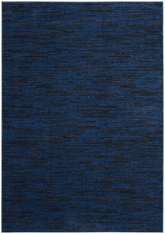 Rectangular navy blue area rug with heathered texture and subtle dark streaks.