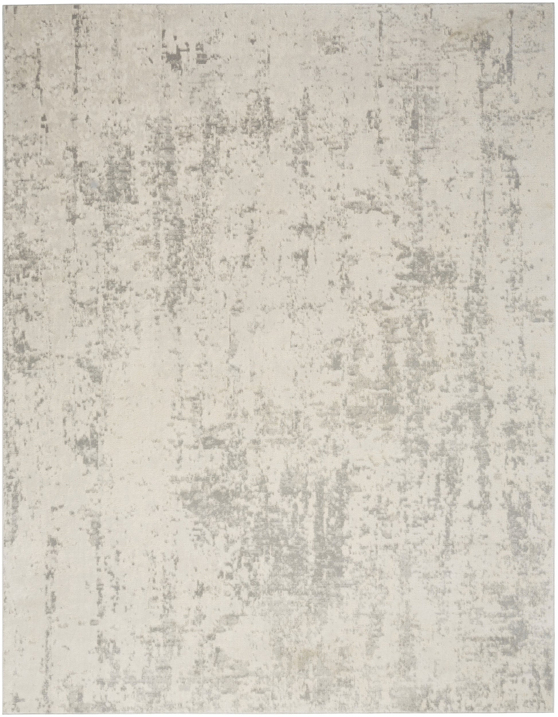 Cream and light gray abstract distressed area rug with soft, low-pile texture.