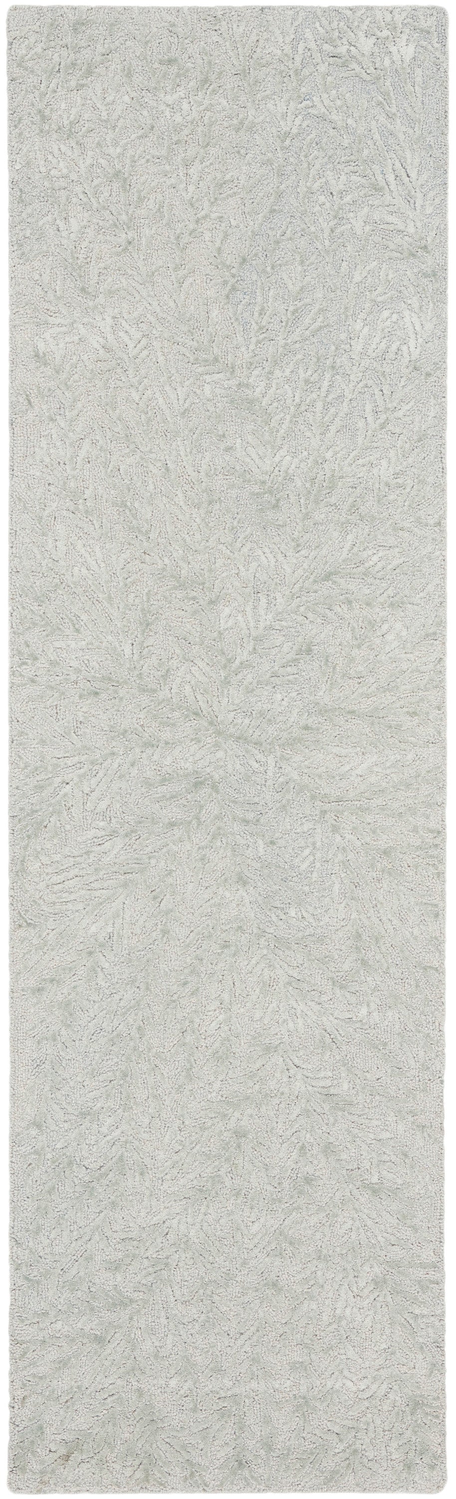 Light gray plush shag runner rug with subtle leafy pattern and soft texture.
