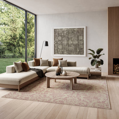 Beige vintage rug with a subtle pattern, 6' x 9'.