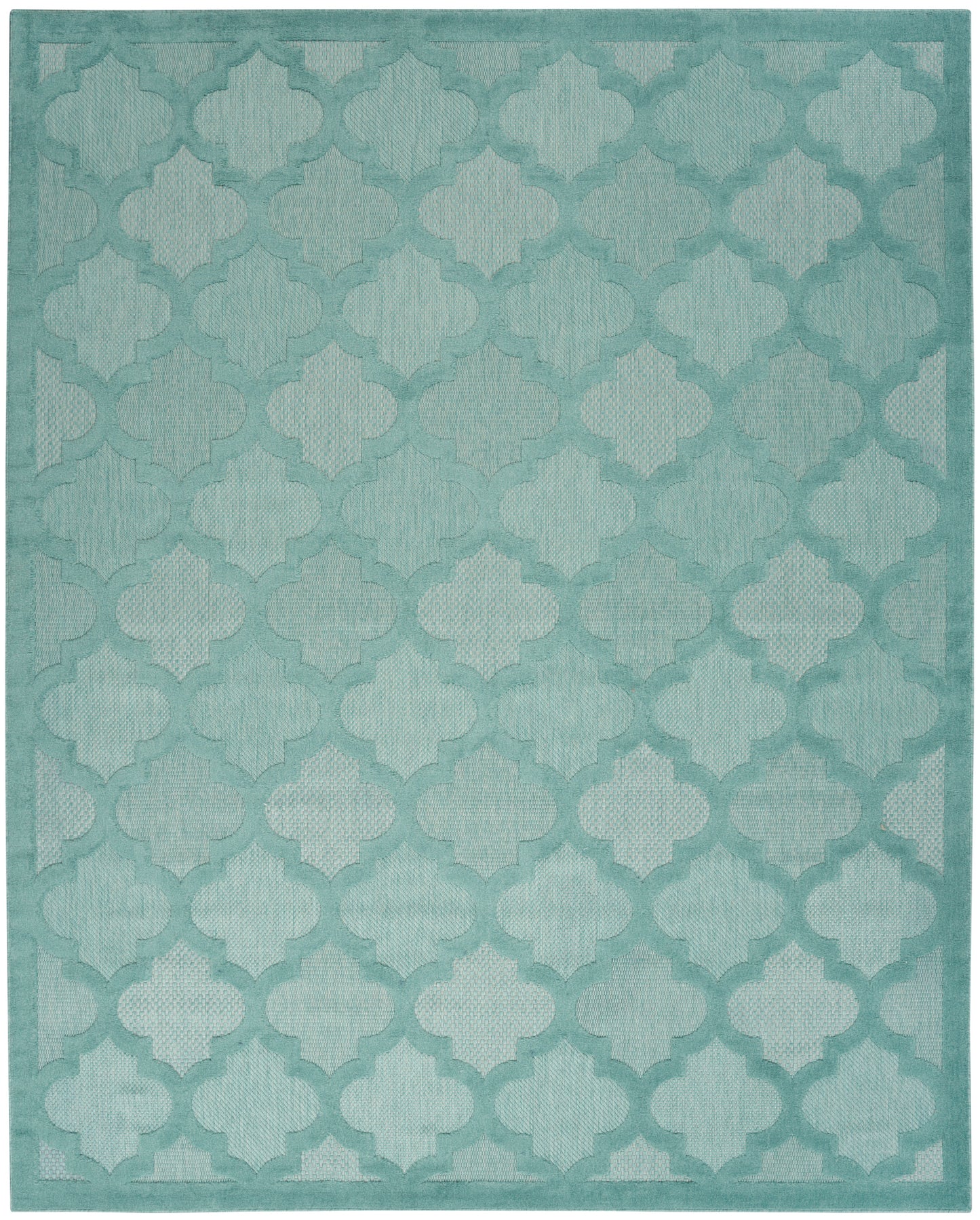 Rectangular teal area rug with repeating quattrofoil trellis pattern and subtle gradient.