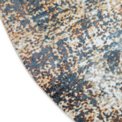 Round rug in blue, tan & ivory speckled abstract pattern; textured woven surface.