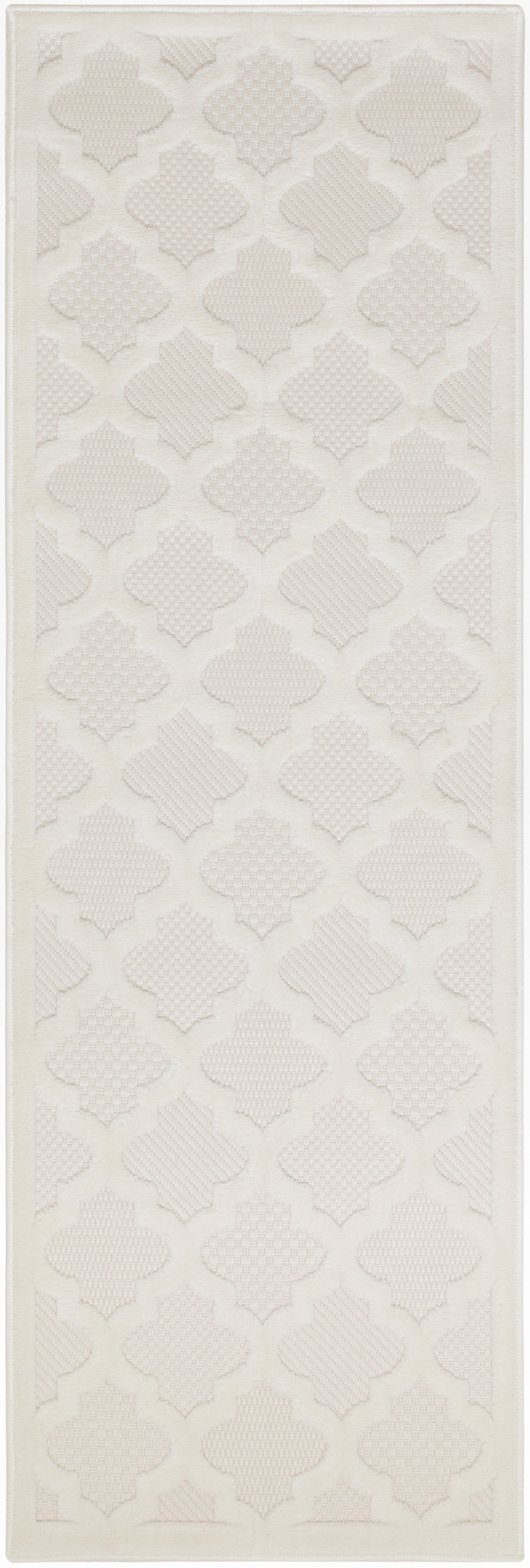 Ivory textured rug runner with repeating quatrefoil lattice pattern and soft woven surface.