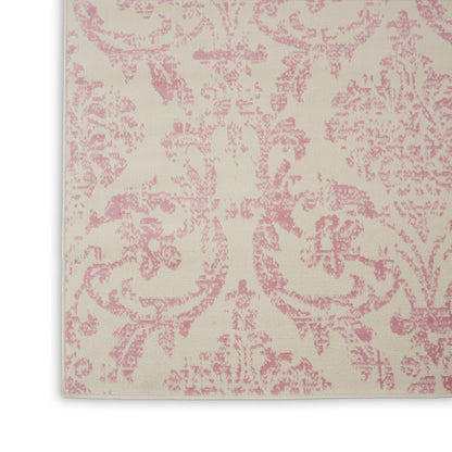 Cream fabric with pink damask floral pattern, decorative textile swatch.