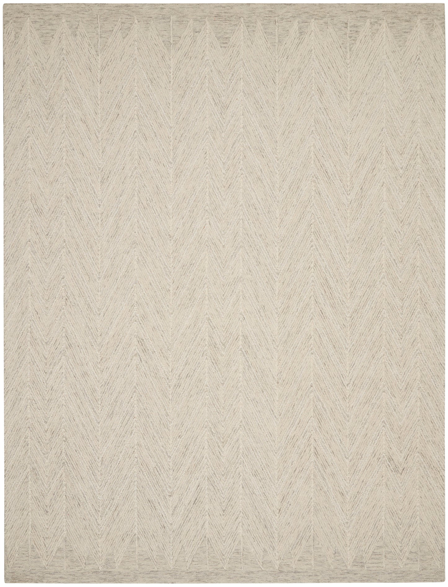 Neutral beige woven area rug with tonal chevron pattern and soft texture.