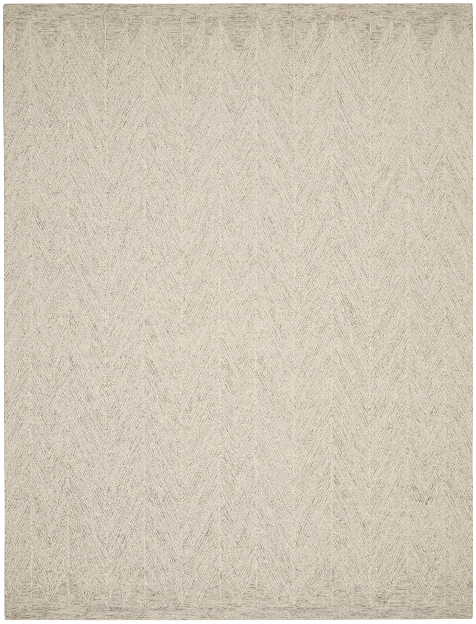 Neutral beige woven area rug with tonal chevron pattern and soft texture.