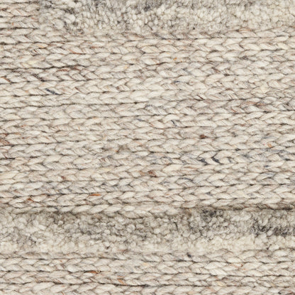 Beige cream chunky loop-woven rug with a soft border; natural wool texture for living rooms.