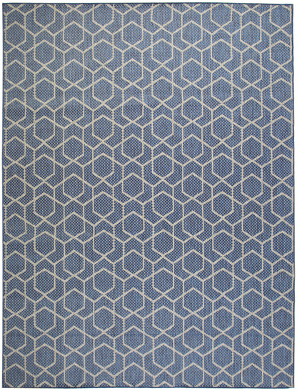 Blue woven rug with cream interlocking hexagon pattern for a modern geometric honeycomb look.
