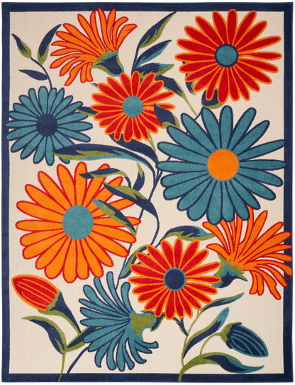 Rectangular rug with bold orange and teal daisies on cream background, bordered in dark navy.