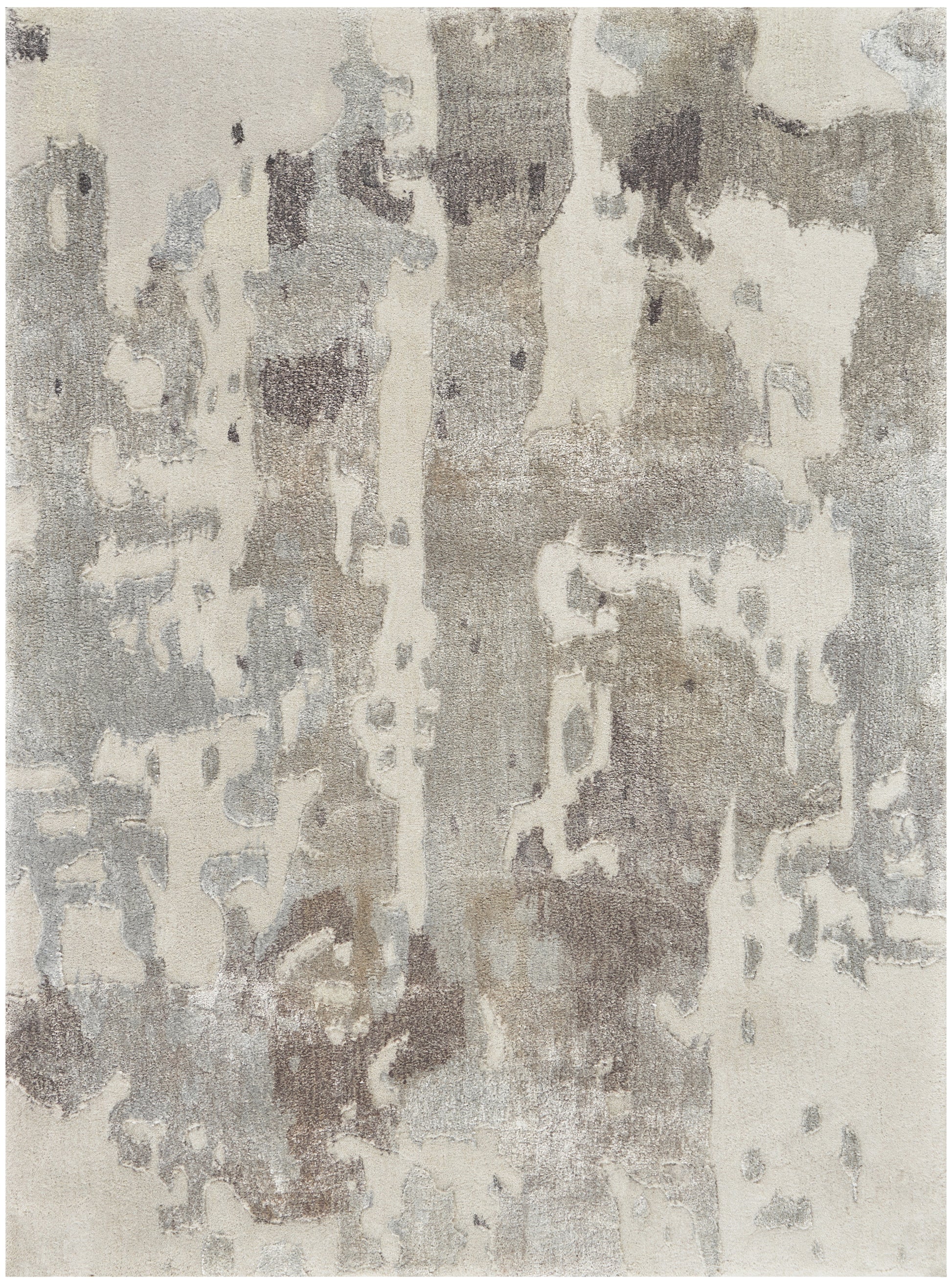 Abstract neutral area rug with beige, taupe, gray and ivory patches in a distressed pattern.