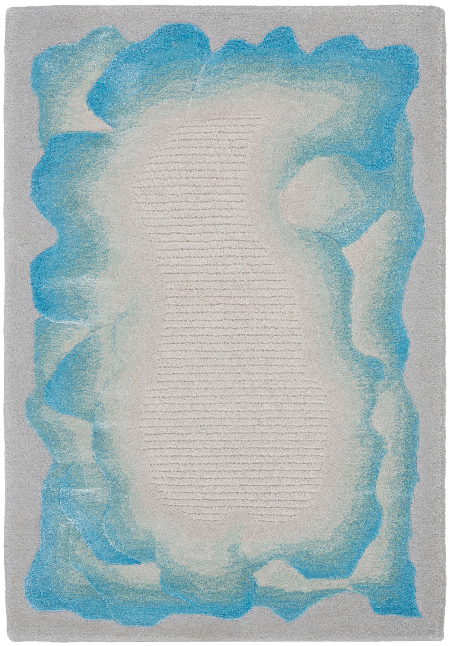 Rectangular abstract rug with cream center, teal-blue gradient border, soft textured look, contemporary ocean-inspired decor.
