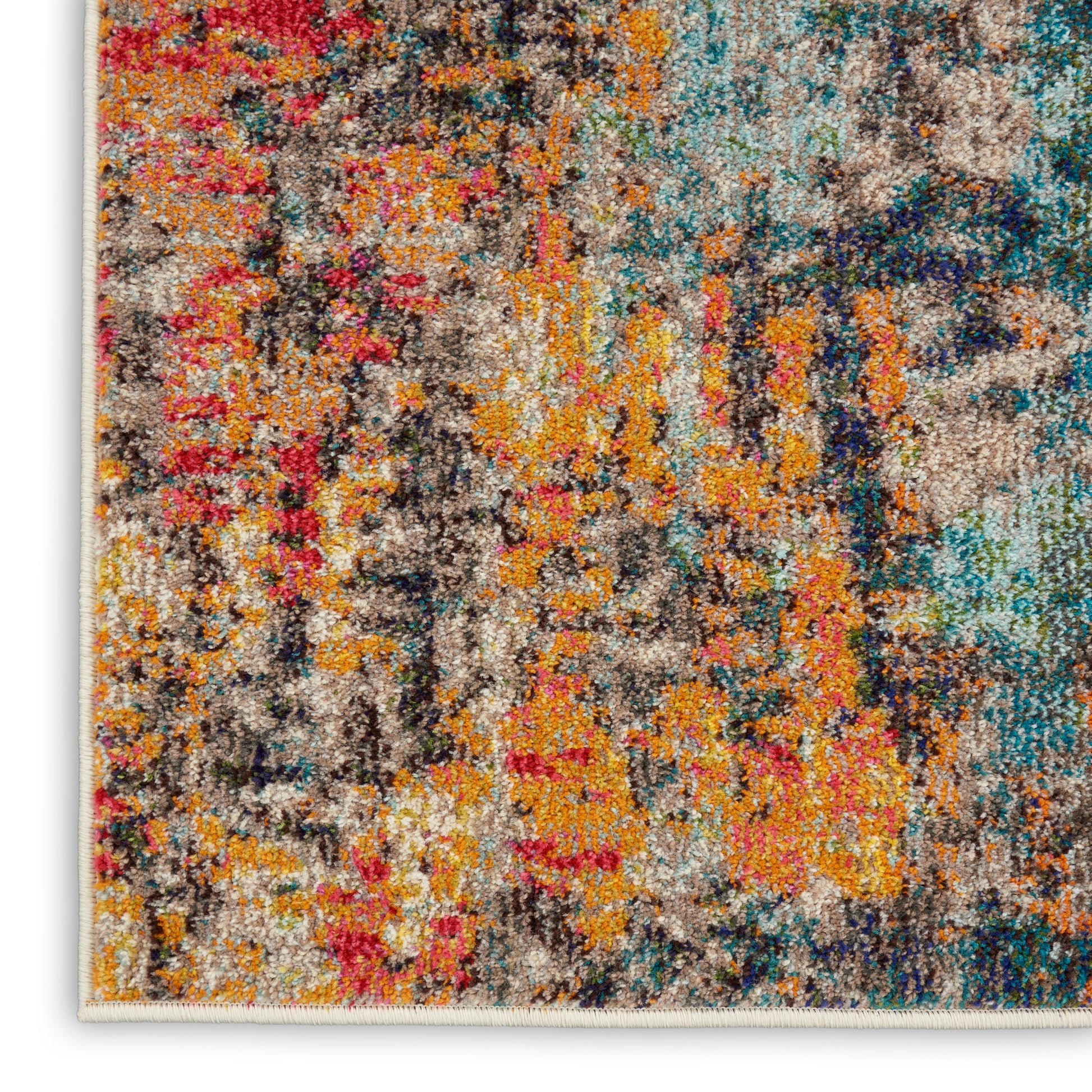 Colorful abstract rug with orange, pink, teal and gray tones; plush tufted pile with light edge trim.