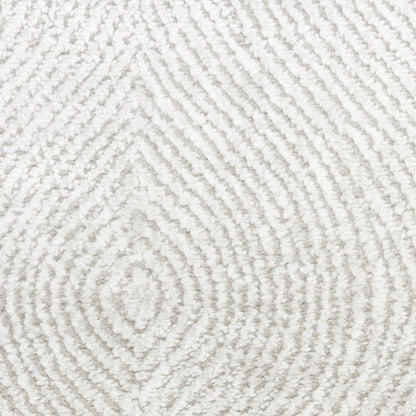 Cream textured area rug with raised concentric diamond pattern in plush loop pile.