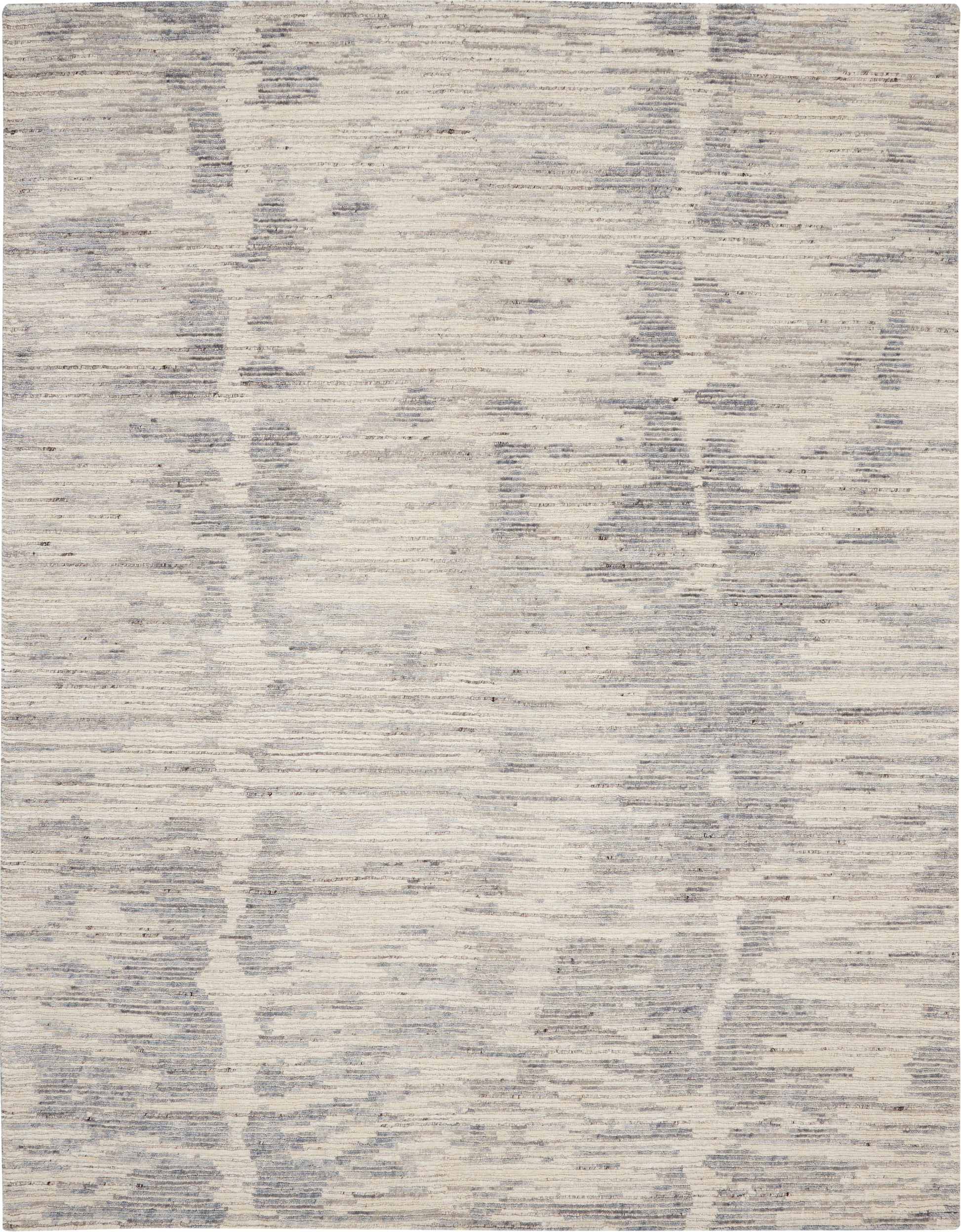 Rectangular area rug in cream & gray with abstract, distressed pattern for contemporary living spaces.