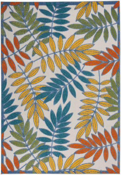 Woven area rug with teal, yellow and orange tropical leaves and a blue border.