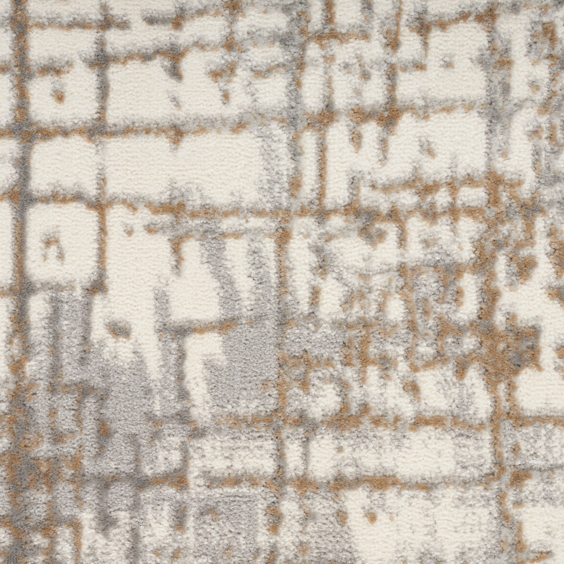 Cream, beige & gray abstract geometric rug with textured pile and brown accents; modern neutral decor.