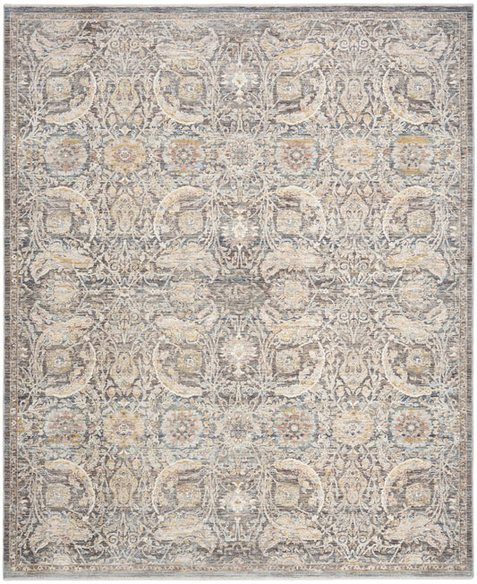 Rectangular traditional Oriental rug in muted blue-gray, beige and ivory with intricate floral medallion pattern.