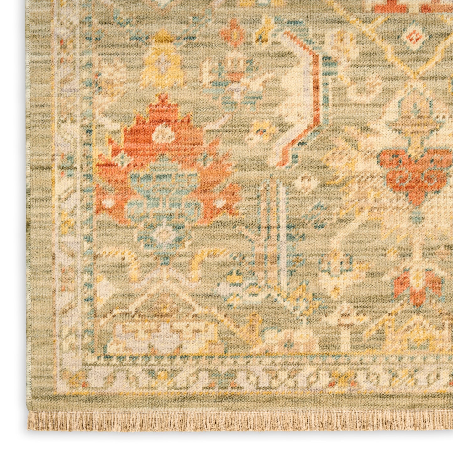 Close-up of a traditional rug with beige field, blue and orange motifs, and fringe along the edge.