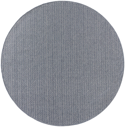 Round gray woven rug with subtle heather texture for modern interiors.