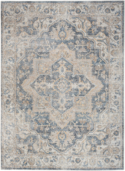 Blue and cream distressed Oriental area rug with a central medallion and floral border, vintage Persian-inspired design.