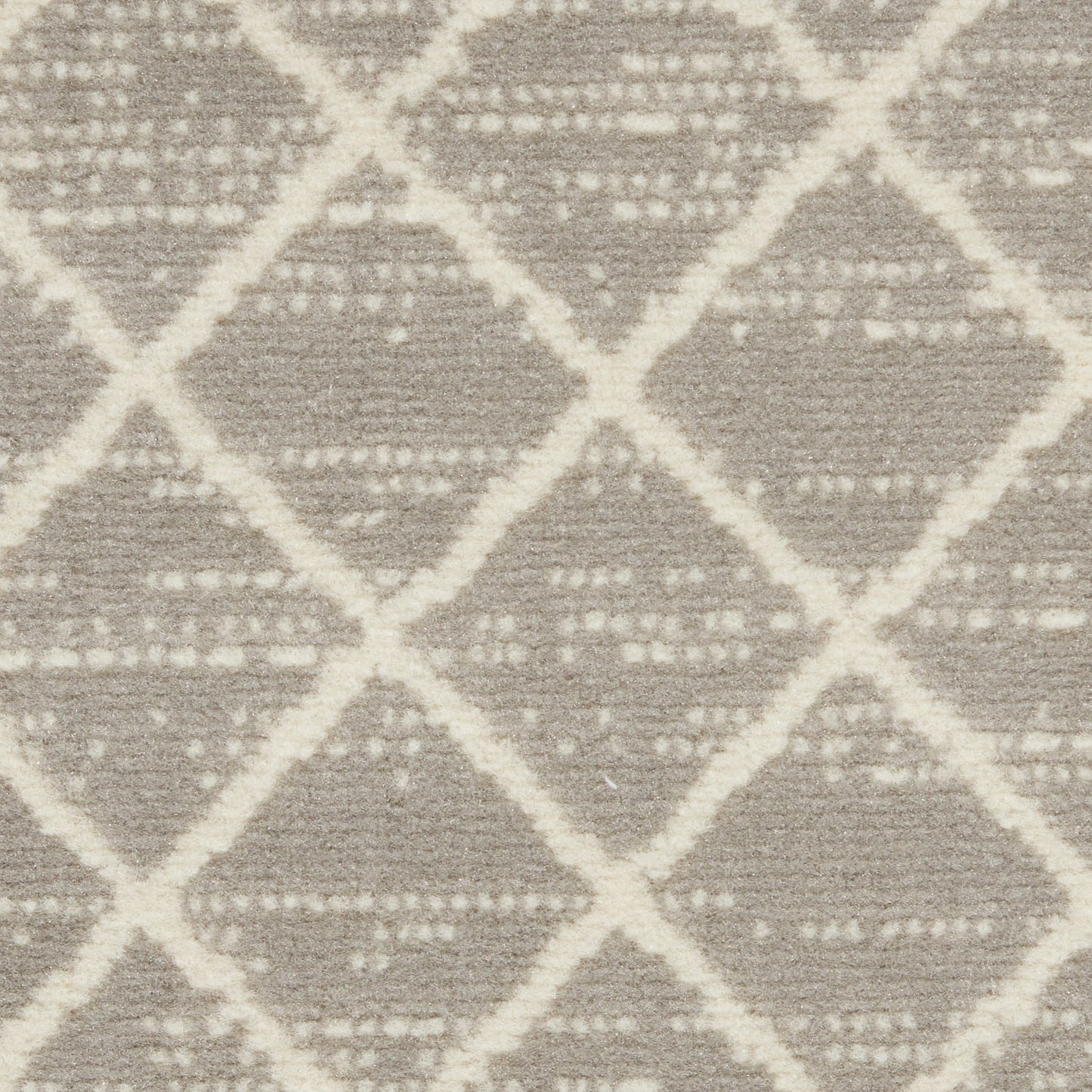 Beige Bohemian rug with cream diamond lattice pattern; soft woven texture.