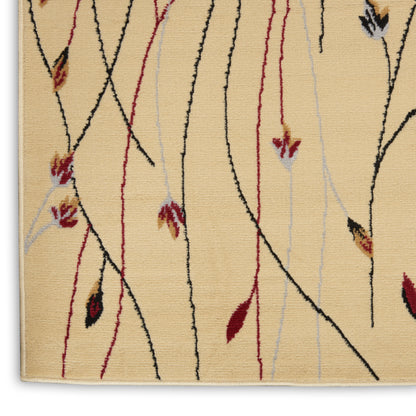 Beige area rug featuring abstract black and red curved lines, pale blue vertical accents and small leaf motifs.
