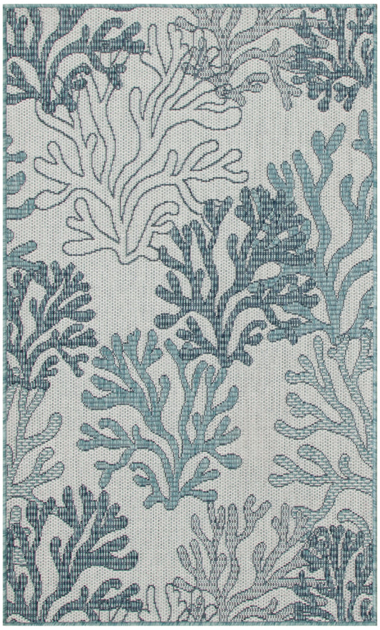 Teal and blue coral reef pattern rug with seaweed motifs on a light gray background.