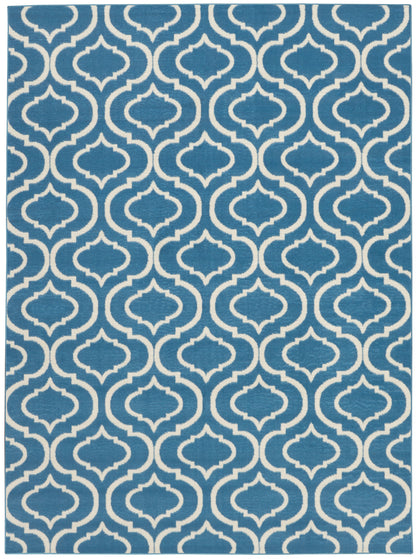 Blue rug with white geometric trellis pattern; repeating lattice shapes for modern, versatile decor.