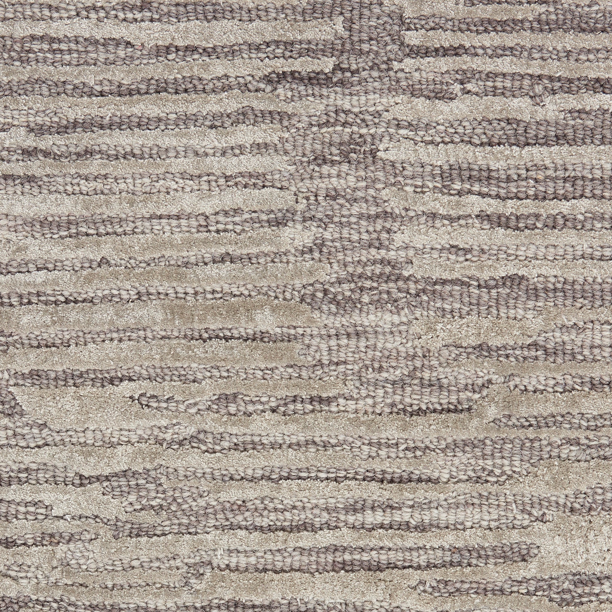 Neutral beige and taupe loop-pile rug with subtle striped, organic pattern; textured, cozy living room accent.