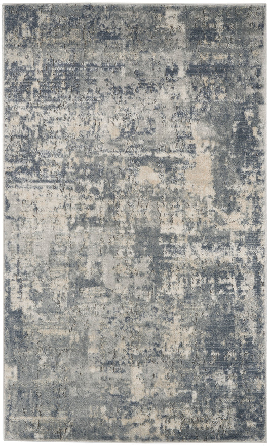 Rectangular area rug in blue-gray & beige with an abstract distressed pattern; modern minimalist style.