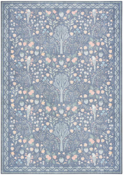 Blue floral area rug with pastel pink and pale yellow blossoms and a decorative border in a modern motif.