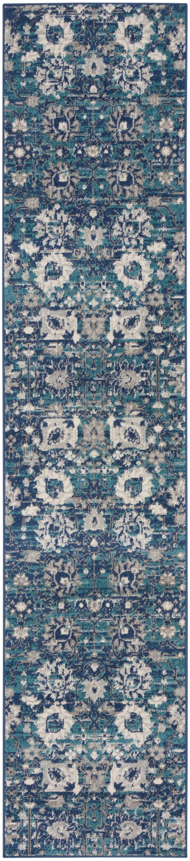 Teal, navy, and cream distressed oriental-style runner rug with intricate repeating medallion pattern.