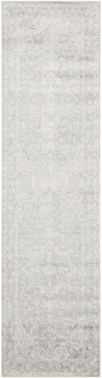 Light gray distressed oriental runner rug, long narrow shape with subtle faded motifs; ideal for hall or entry