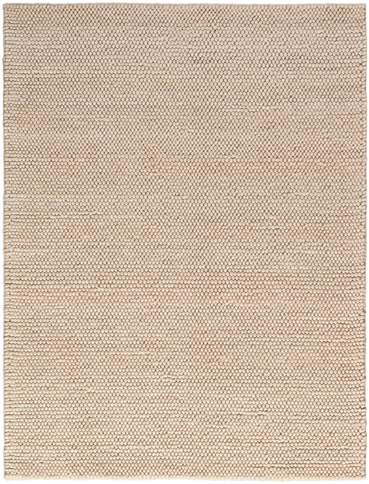 Beige textured looped rug with tiny pebble-like surface; flat-weave rectangle for neutral interiors.